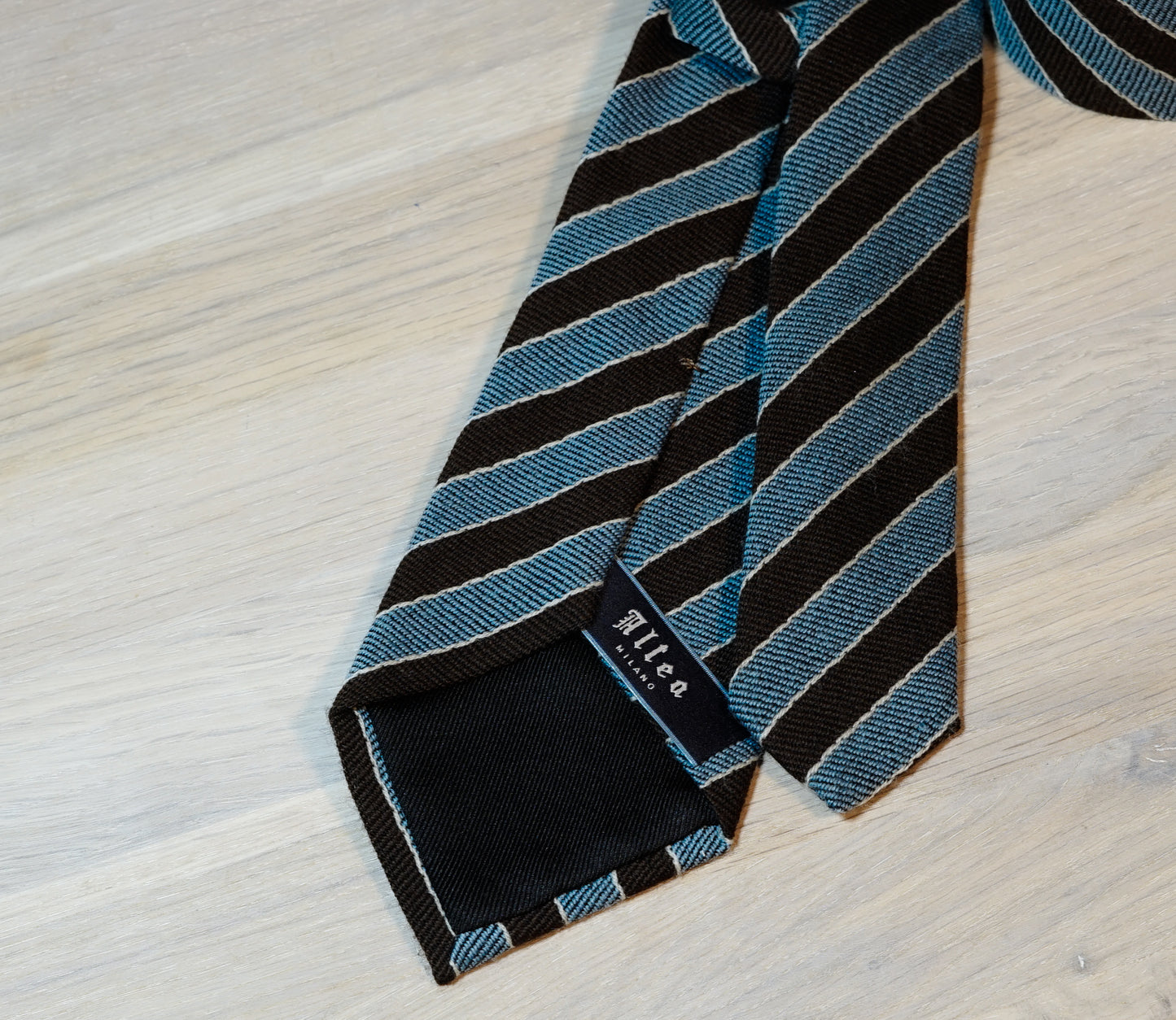 Altea-Brown-turquoise-wool-tie-back