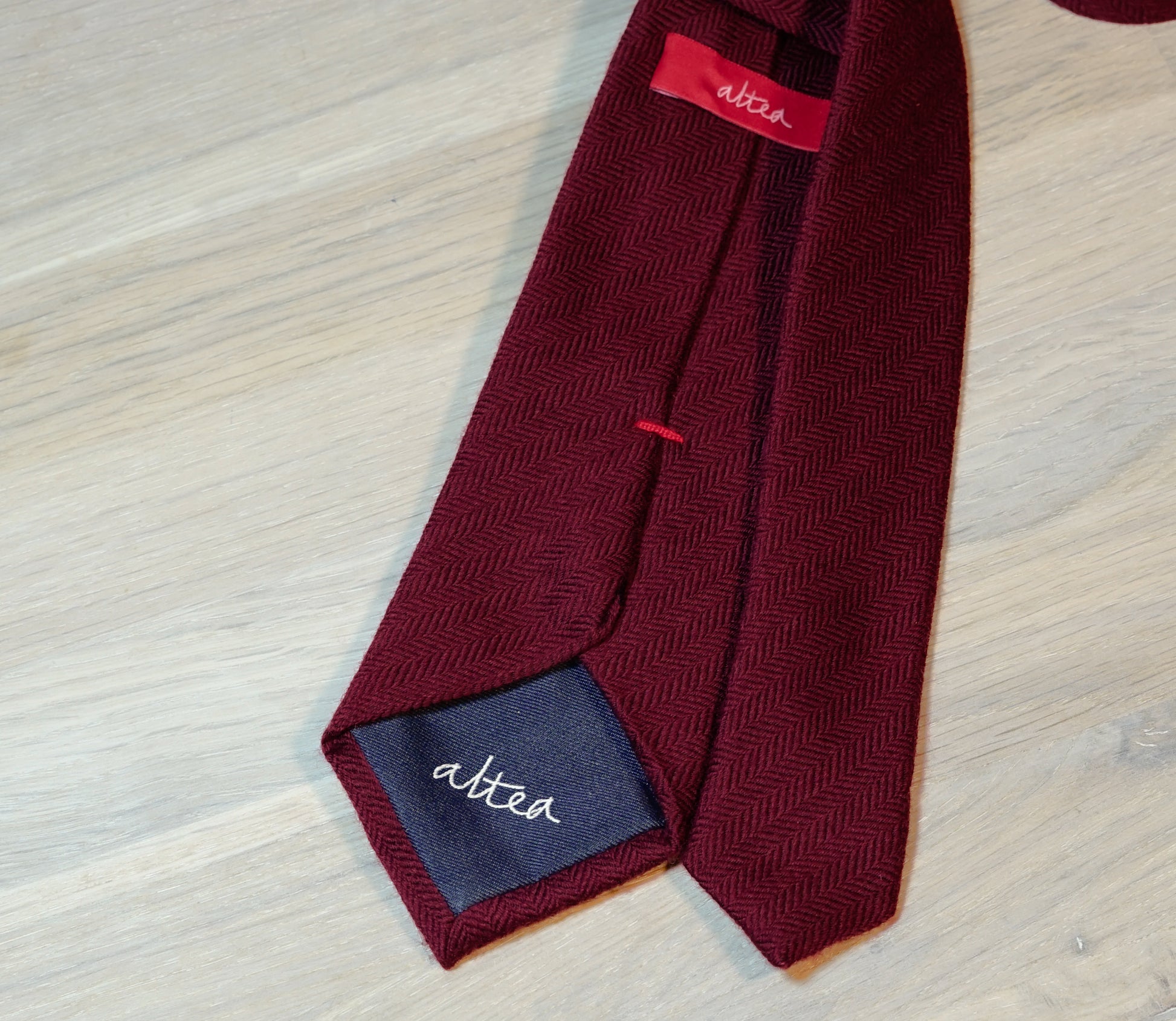 Altea-Burgundy-herringbone-wool-cotton-tie-back