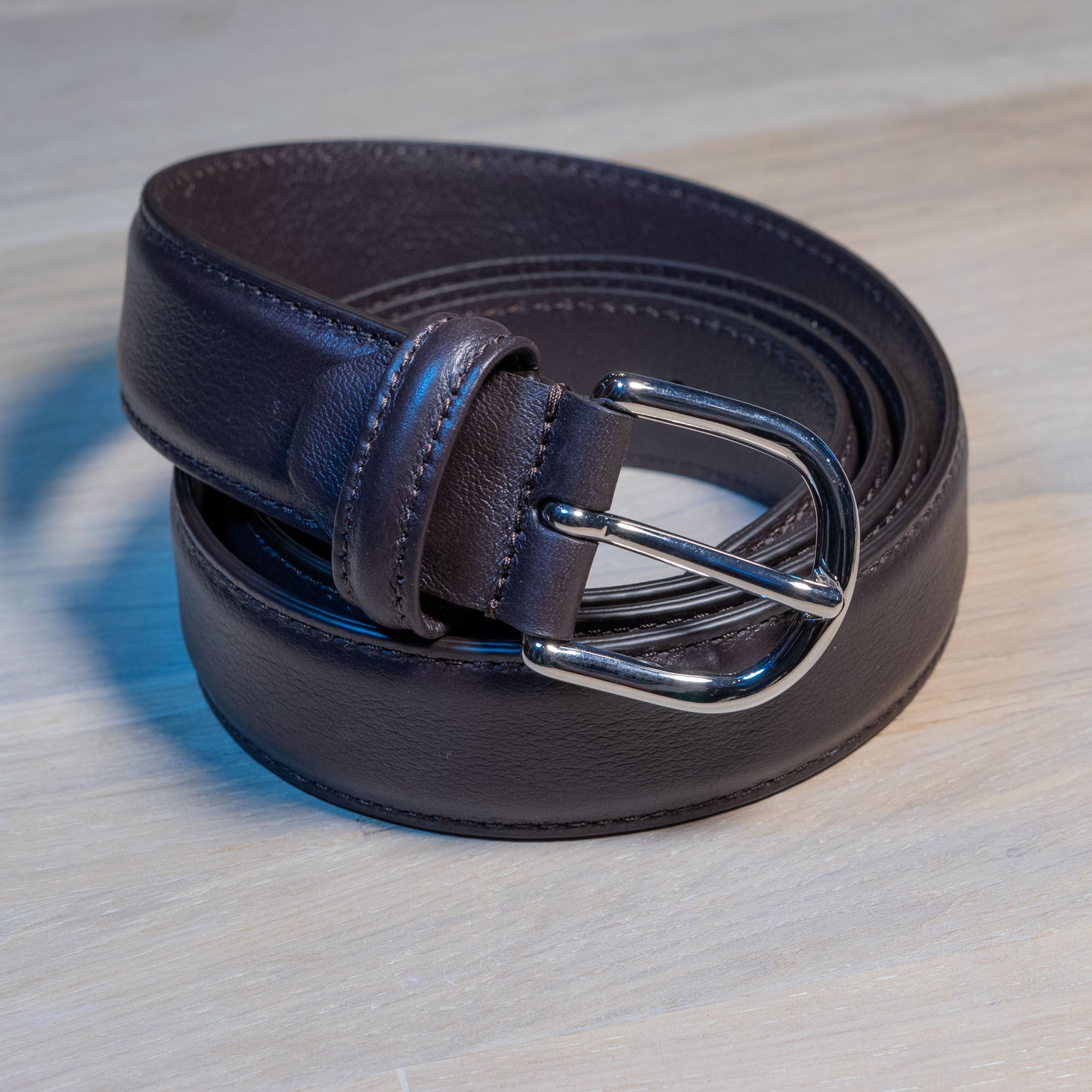 Brown belt silver buckle