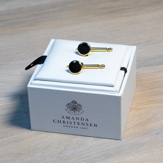 Amanda-Christensen-Gold-Black-Chest-Buttons